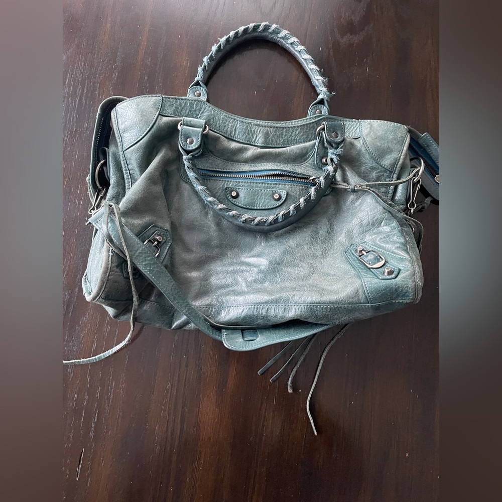 Motorcycle bag. Used condition. Blue-green color.